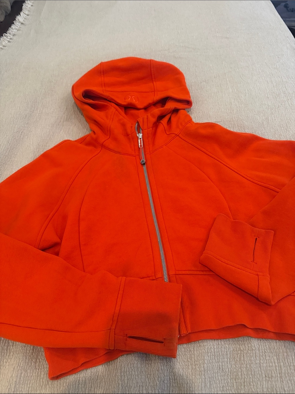 lululemon athletica Bright Orange cropped Zip Hoodie sweatshirt.